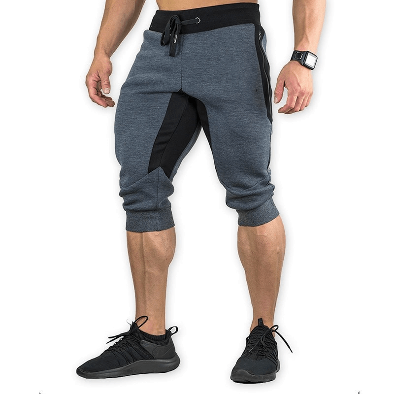 Men's sports shorts with zippered pockets in navy, perfect for running or training. Comfortable cotton-polyester blend. Model SF1134.